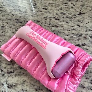 The Skinny Confidential Pink Ice Roller and Sleeping Bag